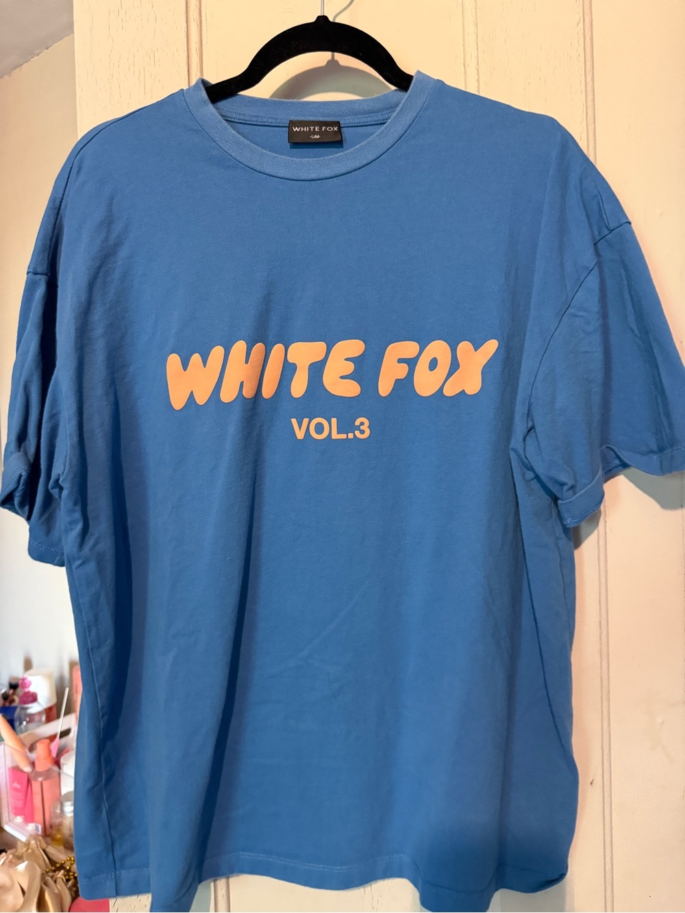 White Fox Boutique Blue Tee with Peach Logo